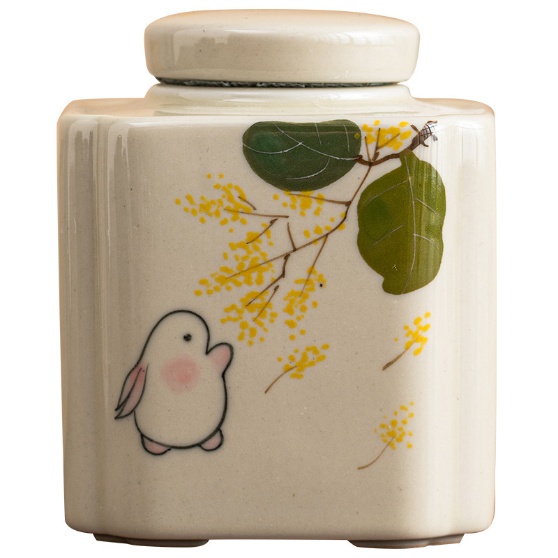 Vẽ tay bình trà thỏ Guiyue Vàng bình kín Bình đựng trà gốm sứ cầm tay nhỏ bình đựng đồ gia dụng chống ẩm