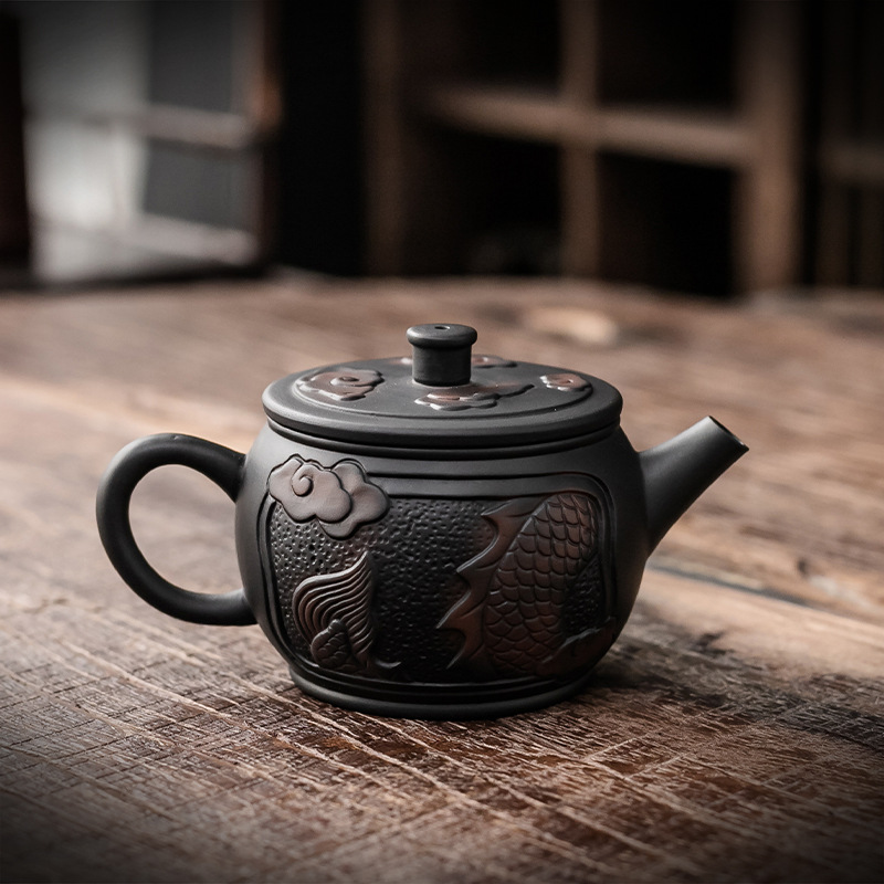 Ấm trà Gốm Tím dụng cụ trà gốm sứ gia dụng Kung Fu ấm trà cầm tay Gốm Tím ấm pha trà cầm tay