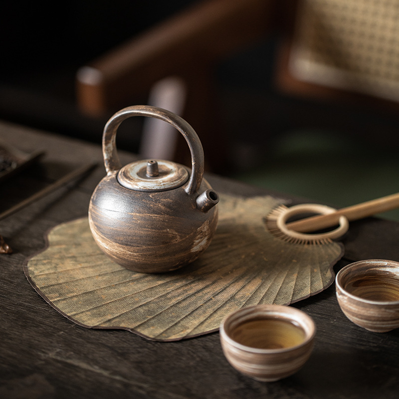 Ấm trà cầm dầm tròn cổ điển gốm thô thủ công ấm trà pha hồng đơn giản kiểu Nhật ấm trà dụng cụ trà Kungfu gia dụng ấm đơn