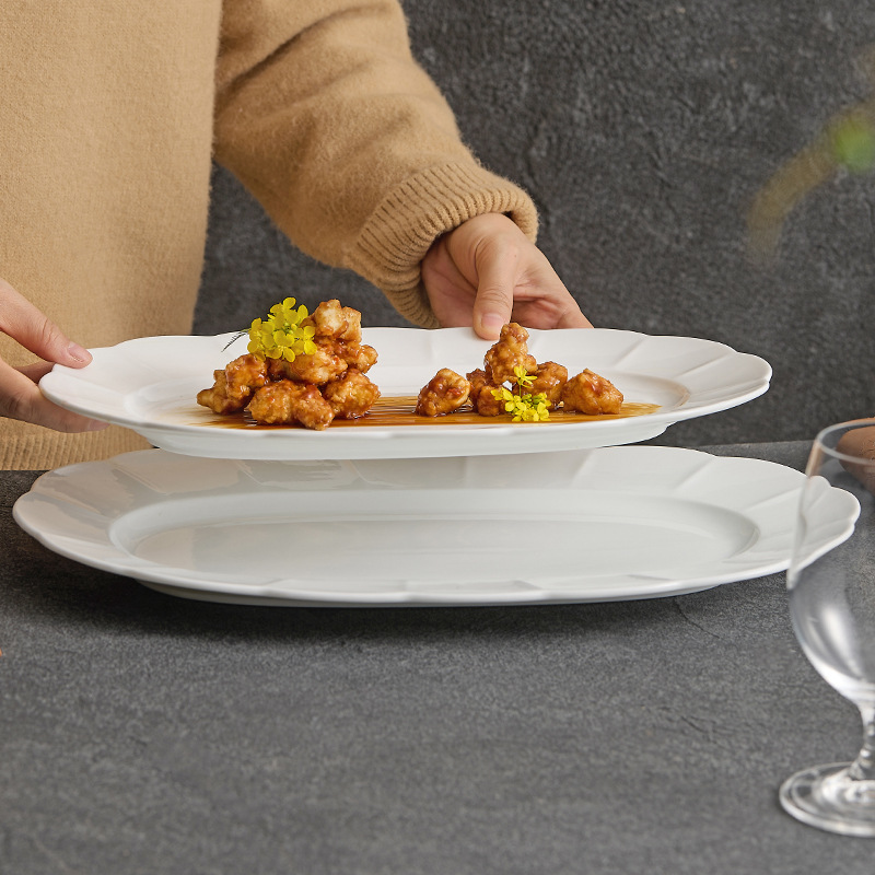 Đĩa gốm cao cấp cảm giác ẩm thực gia dụng đĩa ăn sáng tạo bộ đồ ăn khách sạn đĩa hình bầu dục cỡ lớn đĩa đựng cá viền hoa