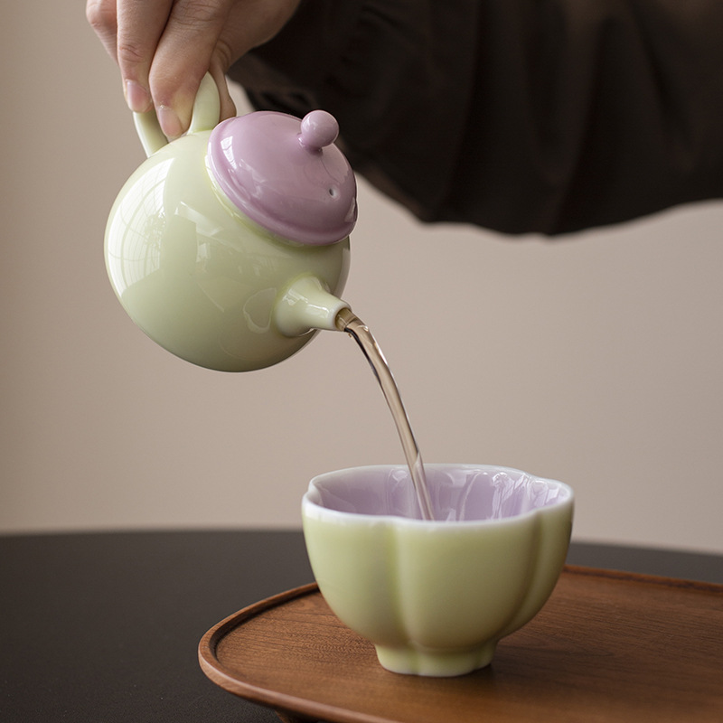 Ấm trà tay cầm bên gốm sứ tươi mới ấm trà ấm trà ấm trà ấm trà phòng trà cổ điển ấm trà tráng men màu Trung Quốc gia dụng
