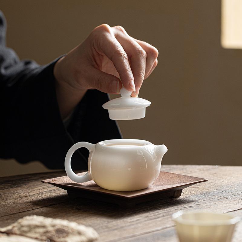 Đá ngọc Sứ mỡ cừu Ngọc Ấm trà nhỏ ấm trà Xi Shi ấm trà đơn sứ trắng Dehua Kung Fu ấm trà gia dụng