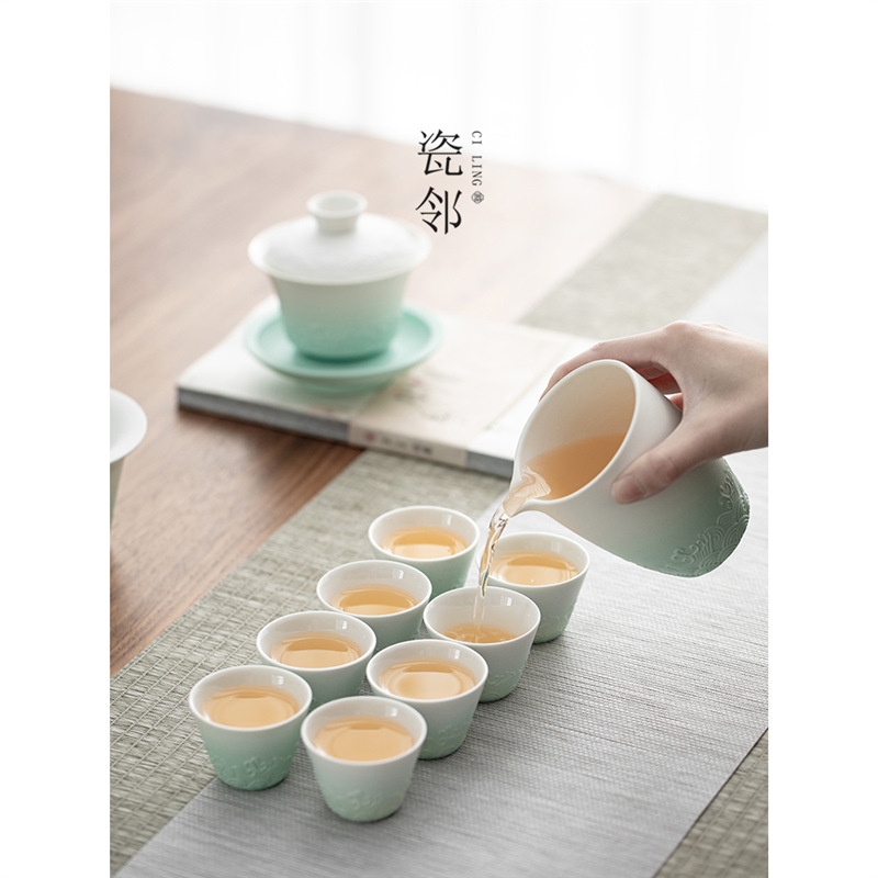 Bộ dụng cụ pha trà Kung Fu Bộ dụng cụ pha trà chạy văn phòng gia dụng bằng gốm sứ tay cầm bên nắp bát cốc trà trọn bộ hộp quà bán buôn