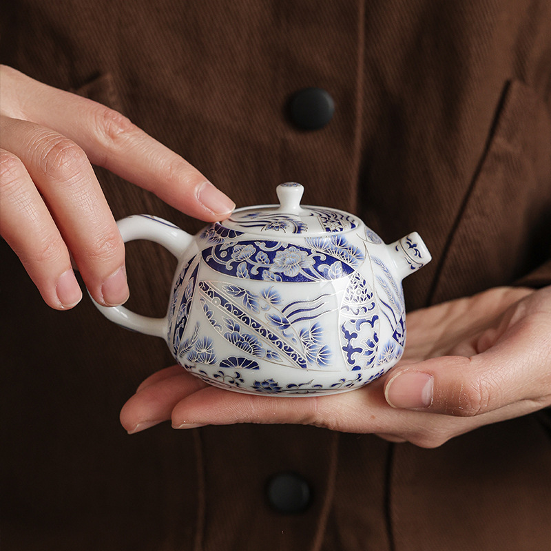 Bộ trà Kung Fu một ấm hai tách hoa văn tảo cá bạc cloisonné hộp quà gốm sứ quà tặng khách hàng lớn tuổi quà tặng
