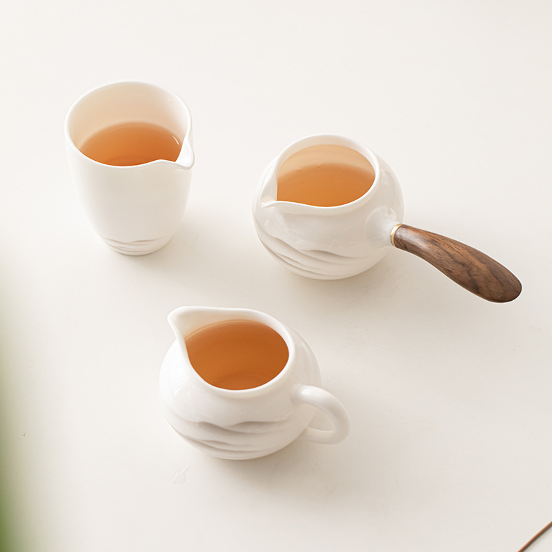 Cốc sứ trắng ngọc bích gốm sứ cốc trà Haifen dụng cụ trà Kungfu dụng cụ trà gia dụng đơn giản không nóng tay