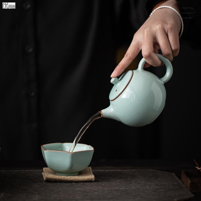 Lò nung Houhu Ru sứ Xi Shi ấm trà gốm sứ Kung Fu bộ trà ấm pha trà Ru Lò nung cánh ve sầu mở một cái ấm đơn nhỏ
