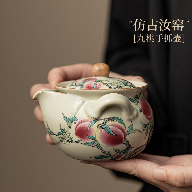 Ấm cầm tay chín đào ở lò Ru ấm trà gia dụng bát trà gốm sứ chống bỏng tách trà bộ ấm trà có thể giữ ấm hộp quà tặng