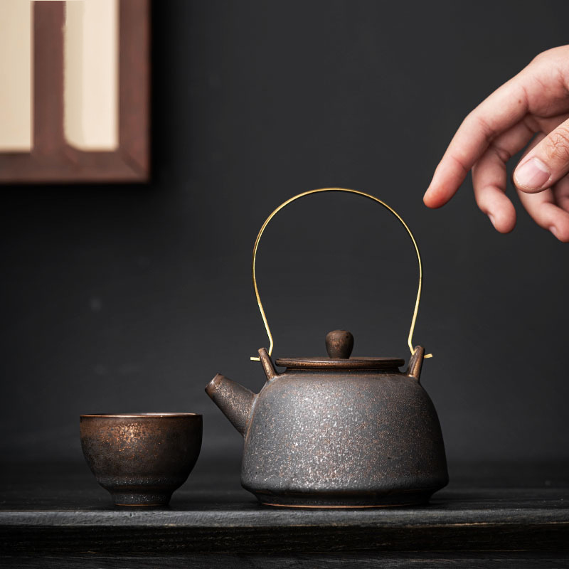 Ấm trà gốm sứ gia dụng ấm trà có dầm lọc cổ điển kiểu Trung Quốc ấm trà bộ trà công phu ấm trà ấm trà một ấm bán buôn