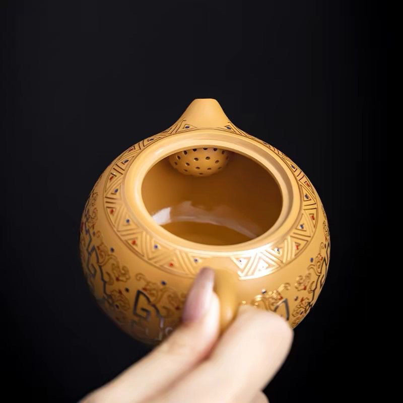 Ấm đất sét màu tím phần vàng ấm Fengming ấm Xi Shi ấm trà tráng men Đôn Hoàng ấm trà đơn bộ ấm trà tử sa đích thực