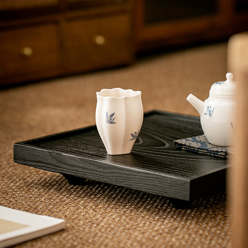 Gốm sứ tinh khiết vẽ tay bướm lan chủ nhân cốc trà sứ trắng cốc trà sứ trắng sáng tạo gia dụng bán buôn cốc trà