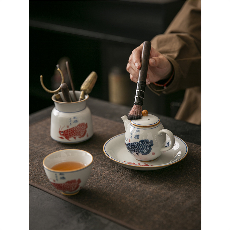 Trà đạo sáu quý ông rồng cá gỗ mun gốm sứ gia dụng kim trà thìa trà kẹp trà bộ trà Kung Fu phụ kiện vật dụng đựng đồ