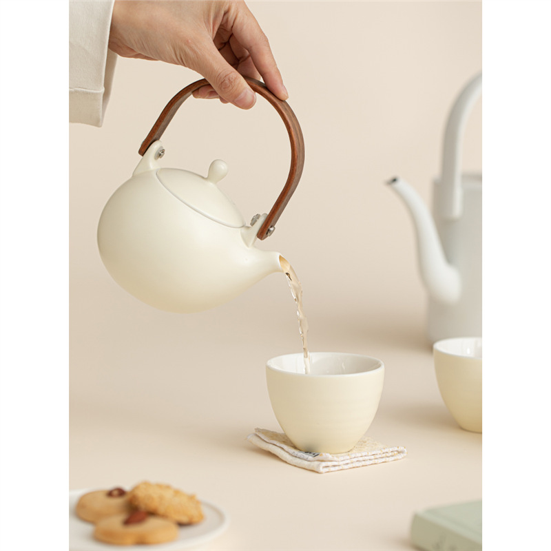 Bộ ấm trà mới 2024 ấm trà gốm sứ thủ công phong cách kem ấm trà chùm hộp quà đơn giản bộ trà quà tặng