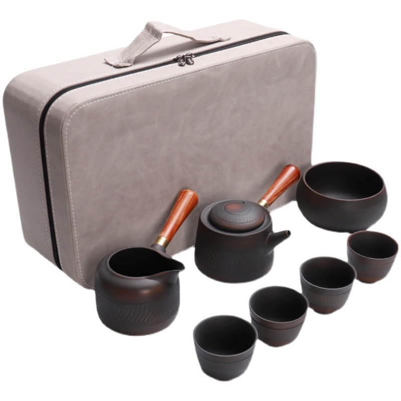 Bộ ấm trà du lịch gốm tím xách tay du lịch ngoài trời xe du lịch cao cấp khách nhanh một ấm bốn cốc bán buôn quà lưu niệm