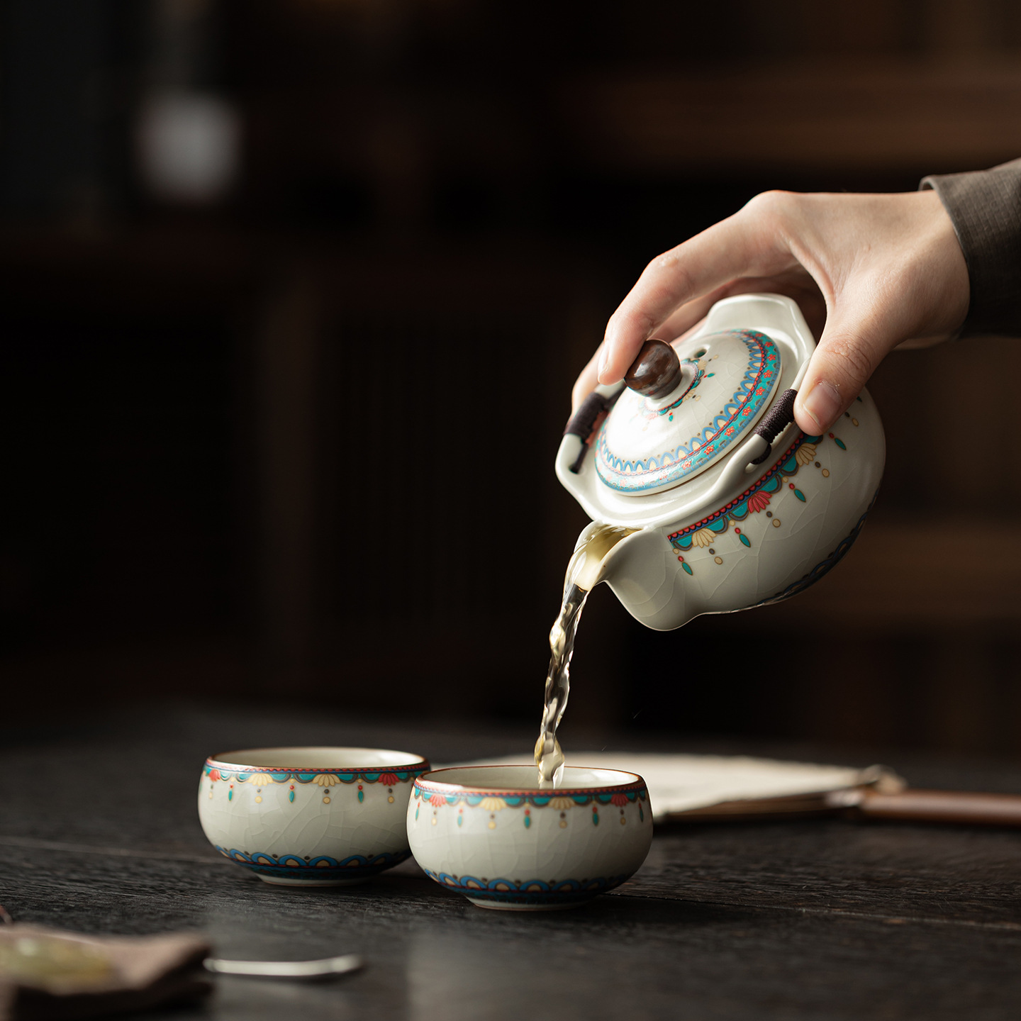 Ru Kiln Đôn Hoàng Ruyi Bộ trà du lịch một ấm hai cốc gốm cầm tay ấm trà ngoài trời pha trà cầm tay quà tặng