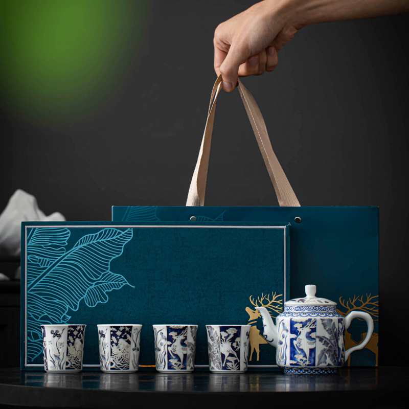 Bộ trà sứ trắng xanh kiểu Trung Quốc, bộ đồ hươu suốt đường, hộp quà tặng nữ một ấm bốn cốc trà, ấm pha trà, quà tặng