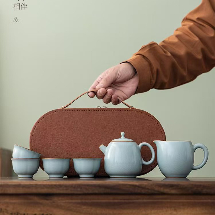 Bộ ấm trà Ru Kiln mở ra có thể nâng ấm trà sứ Ru kiểu Trung Quốc mới, một ấm bốn cốc, bộ trà du lịch Kung Fu, quà lưu niệm