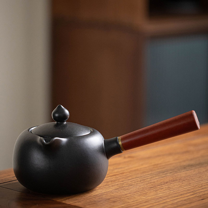 Ấm trà tay cầm bên Baolian ấm pha trà đơn giản kiểu Trung Quốc ấm trà tay cầm bên bằng gốm sứ ấm đun trà quanh bếp
