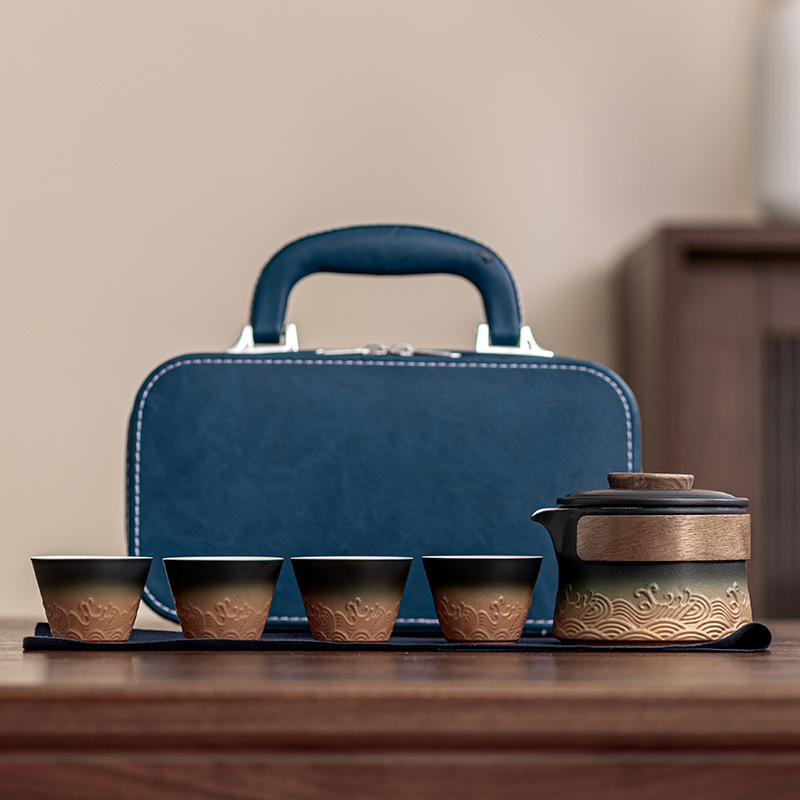 Bộ trà du lịch phong cách Nhật Bản Bộ trà Kuai Ke Bộ trà Kung Fu 1 ấm 4 chén đựng trà ô tô xách tay Bán buôn ấm trà