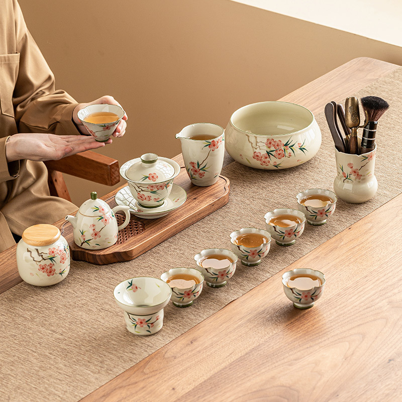 Bộ ấm chén trà hoa đào vẽ tay mẫu mới 2025 dùng cho nhà và văn phòng, chất liệu gốm sứ