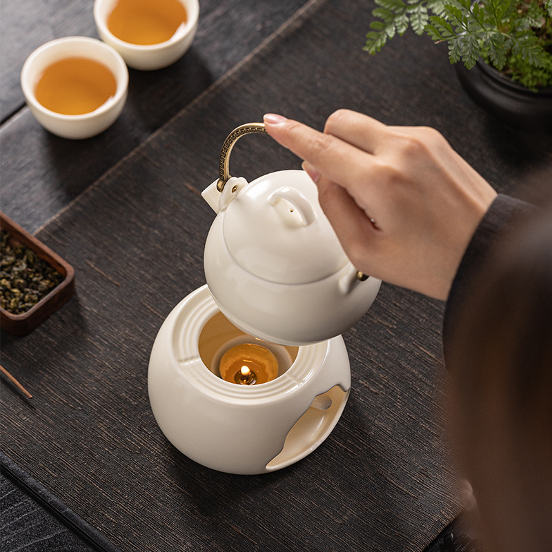 2024 kiểu mới gốm cầm xà ấm ấm ấm trà bếp pha trà xung quanh bếp nến đế ấm trà bộ trà hộp quà pha trà