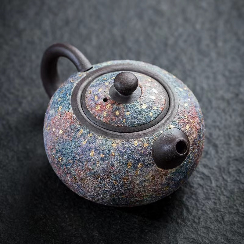 Ấm trà mỏ đá kiểu Nhật dụng cụ pha trà lốp sắt thủ công Lin Peifu dụng cụ pha trà kungfu gia dụng ấm đơn lỗ bóng sáng tạo
