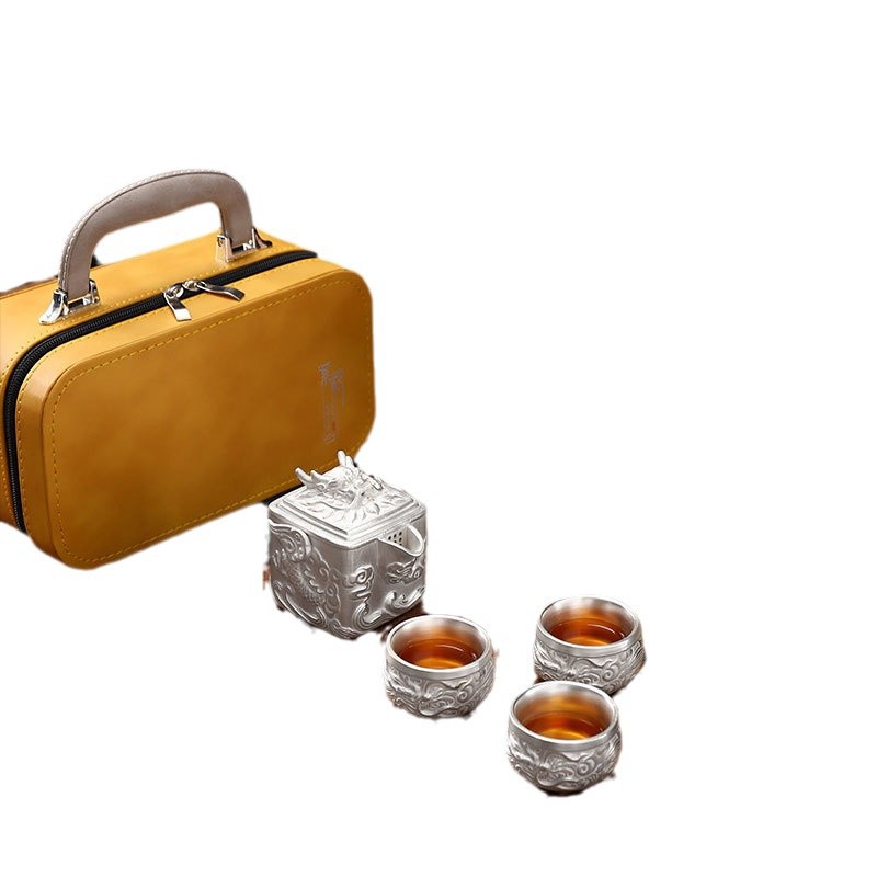 Bộ ấm trà bốn tách màu tím cát rồng bốn biển mạ bạc 999