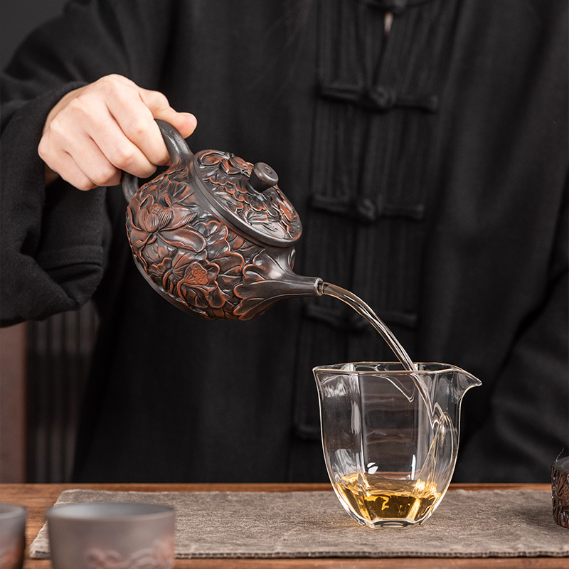 Ấm trà thủ công nổi tiếng Vân Nam gốm tím ấm đơn chạm nổi đầy đủ ấm pha trà chạm khắc ấm trà bộ ấm sức khỏe