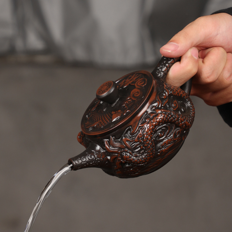 Ấm trà gốm tím Jianshui, ấm trà ngói Hán khắc thủ công, ấm trà Fengming có thể nâng xoay, bộ ấm trà gia dụng