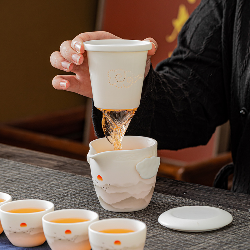 Bộ ấm trà du lịch một ấm bốn cốc gia dụng công ty hàng năm lưu niệm doanh nghiệp ấm trà gốm sứ bán buôn