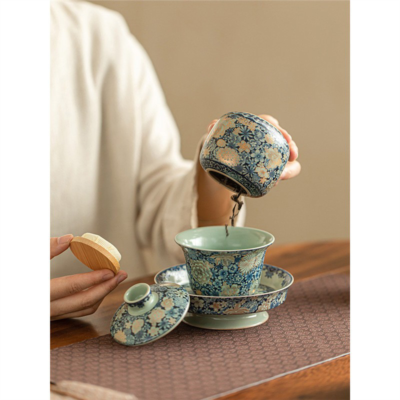 Bình đựng trà hoa Ruyao Bình đựng trà Pu'er nhỏ gia dụng Bình đựng trà gốm sứ cao cấp cầm tay ngoài trời