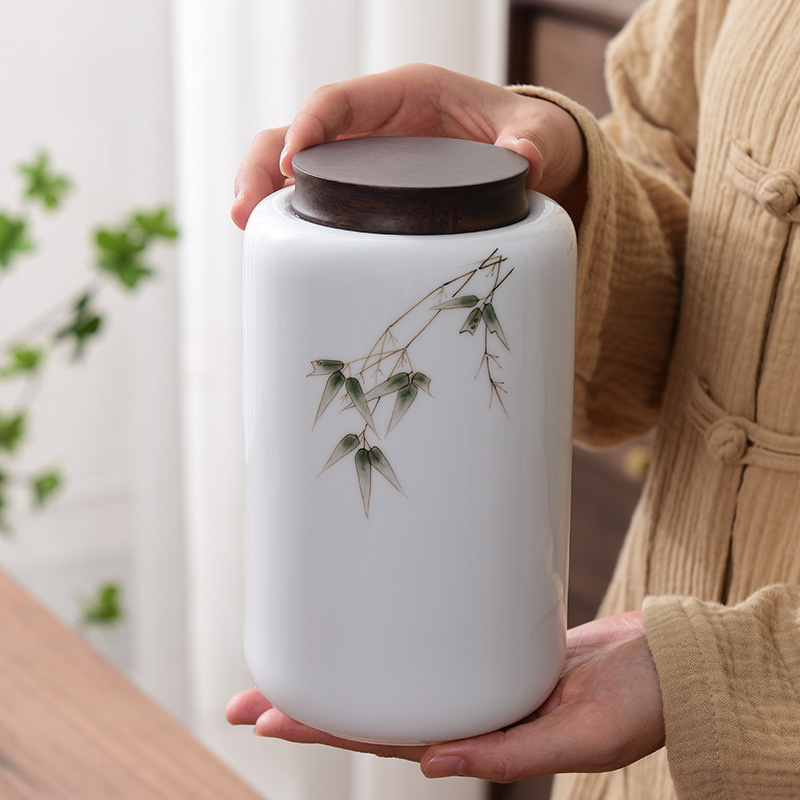 Hộp đựng trà sứ trắng vẽ tay, hộp đựng trà hoa gia dụng Pu'er, hộp đựng gỗ đàn hương đen, hộp chống ẩm, bán buôn gốm sứ cỡ lớn