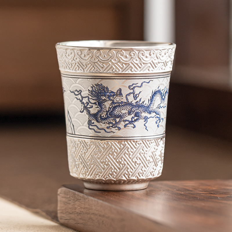 Bộ trà sang trọng ánh sáng bạc 999 cốc trà gốm sứ cốc chủ nhân rồng bay cốc đồng hồ mây cốc trà đặc biệt