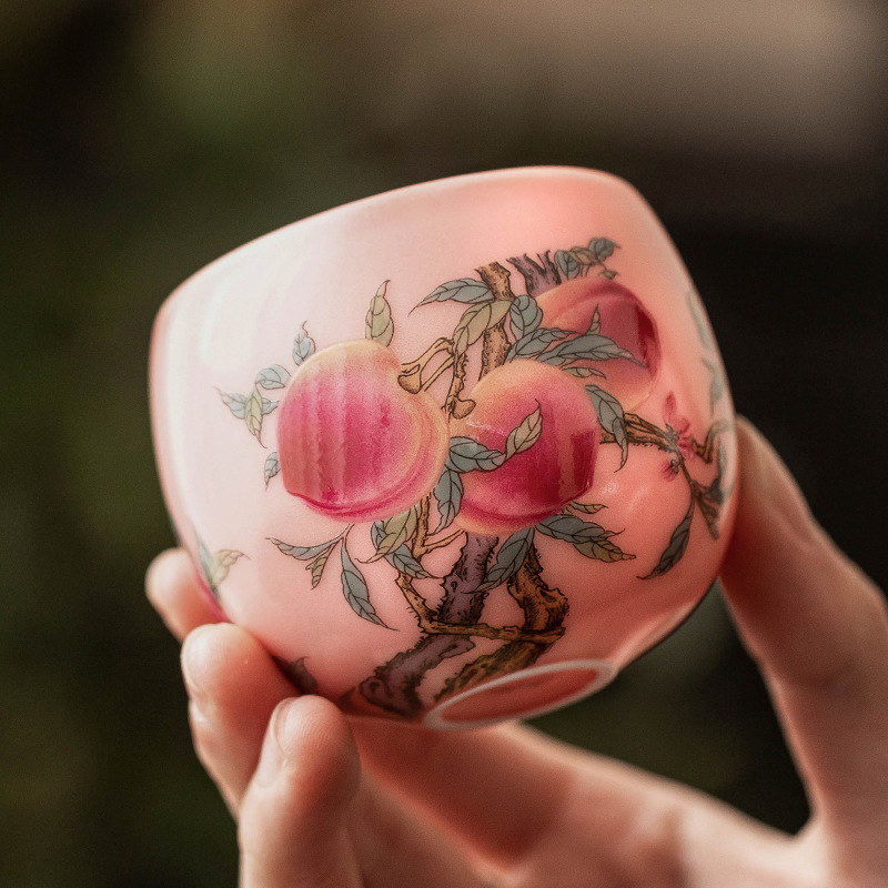 Cốc trà gốm sứ cốc chủ nhân cao cấp mỡ lợn bột đông Rufencai chín đào tròn cốc trà cốc trà cốc đơn