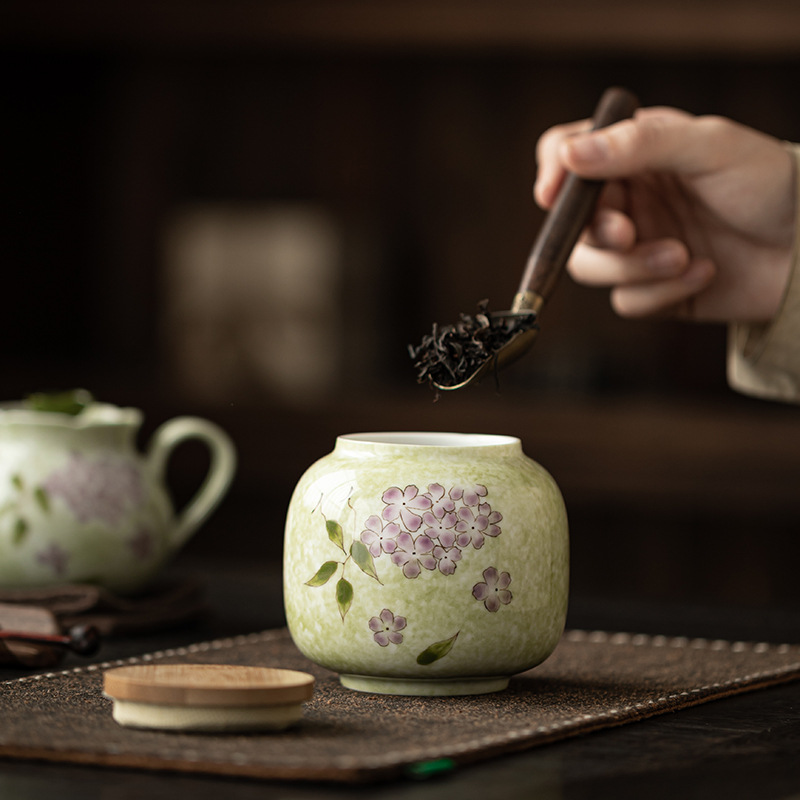 Vẽ tay hoa cẩm tú cầu trà bình hộ gia đình gốm sứ kín lọ chống ẩm lọ trà di động lưu trữ lọ trà mini kho