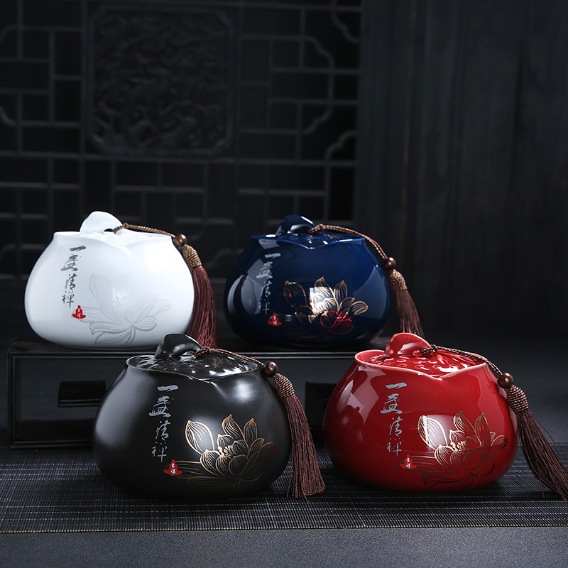Bình trà gốm Jilan kín gia dụng nửa catty một catty retro lớn số lớn bình trà lưu trữ màu đỏ