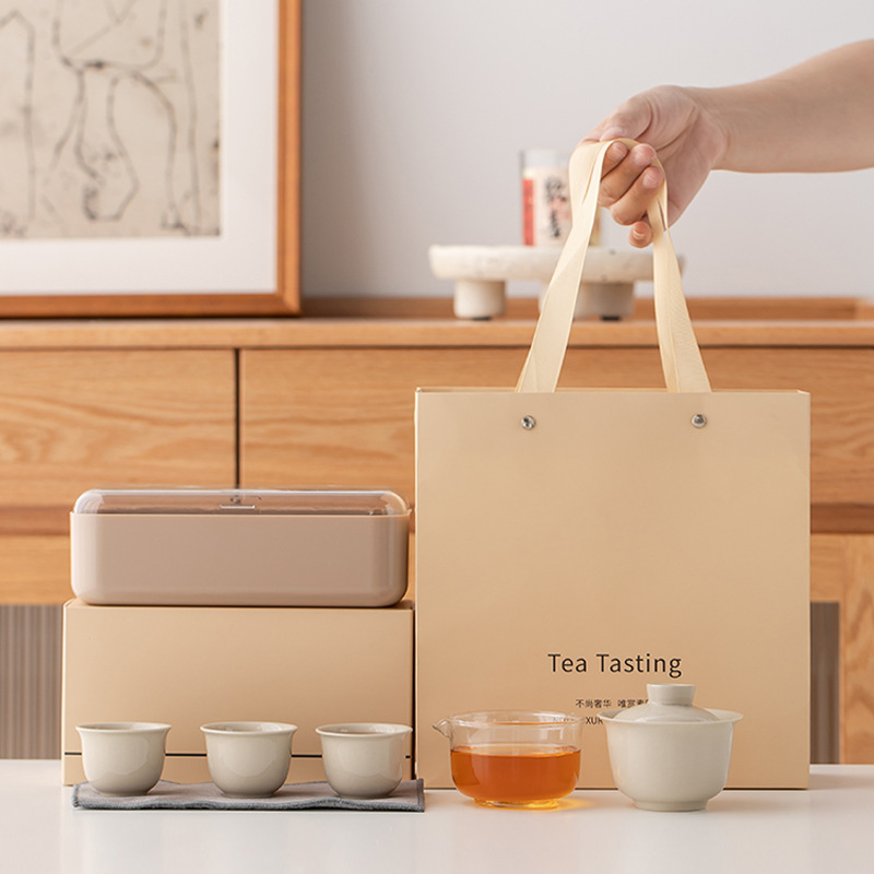 Bộ trà du lịch một ấm ba chén bát có nắp gốm sứ ngoài trời hộp đựng đồ xách tay nhỏ bàn trà bong bóng kinh doanh logo quà tặng