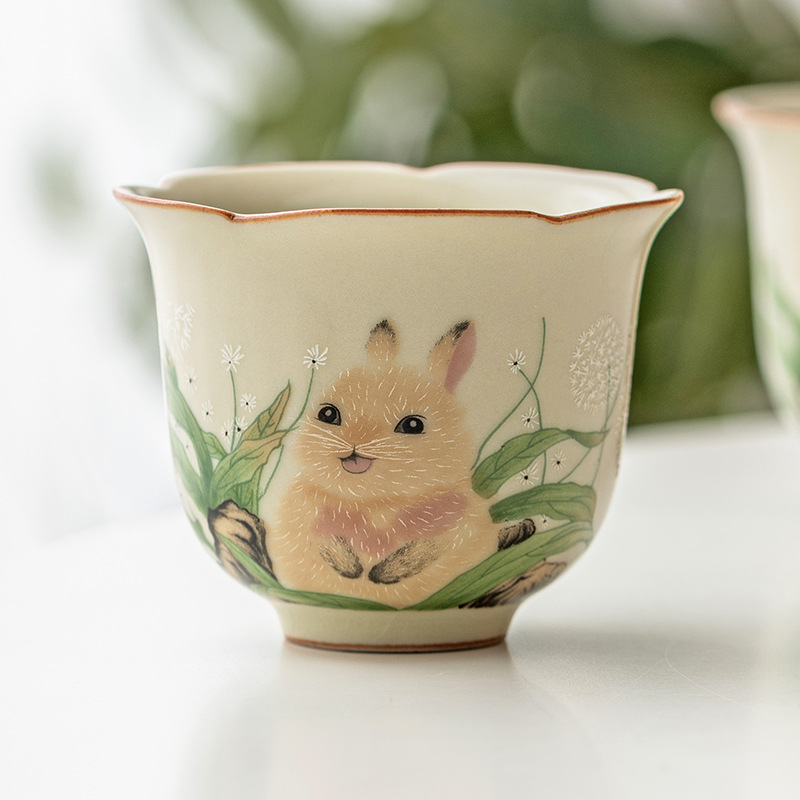 Thỏ Ru Lò Kwai Miệng Cánh hoa Cốc gốm sứ Kung Fu Cốc chủ nhân Cốc đơn Bộ trà dễ thương Cốc trà Chén trà