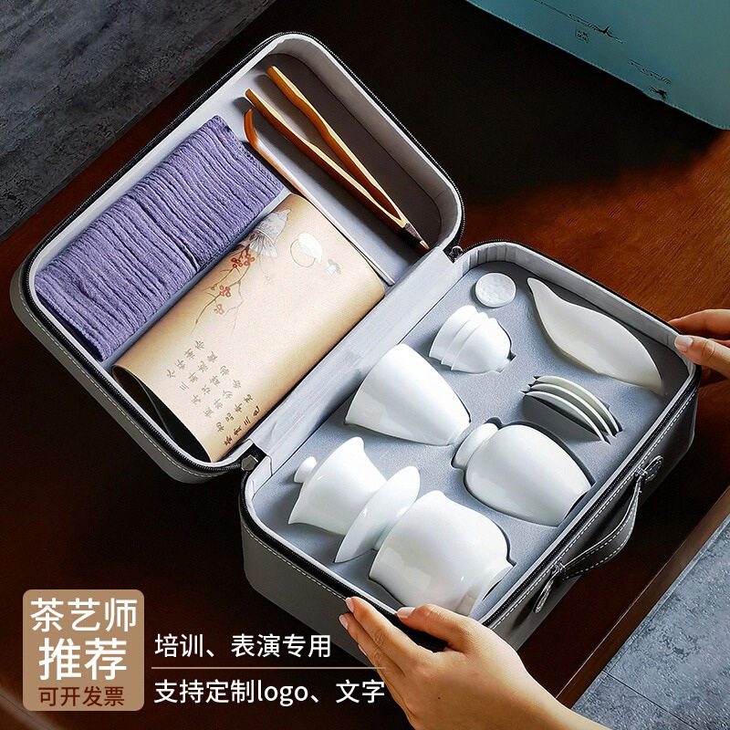 Phong cách Trung Quốc màu xanh và trắng sứ nghệ thuật dạy trà giáo viên đào tạo giáo viên nghệ thuật trà luyện thi bộ trà kung fu bộ bát đựng đồ xách tay