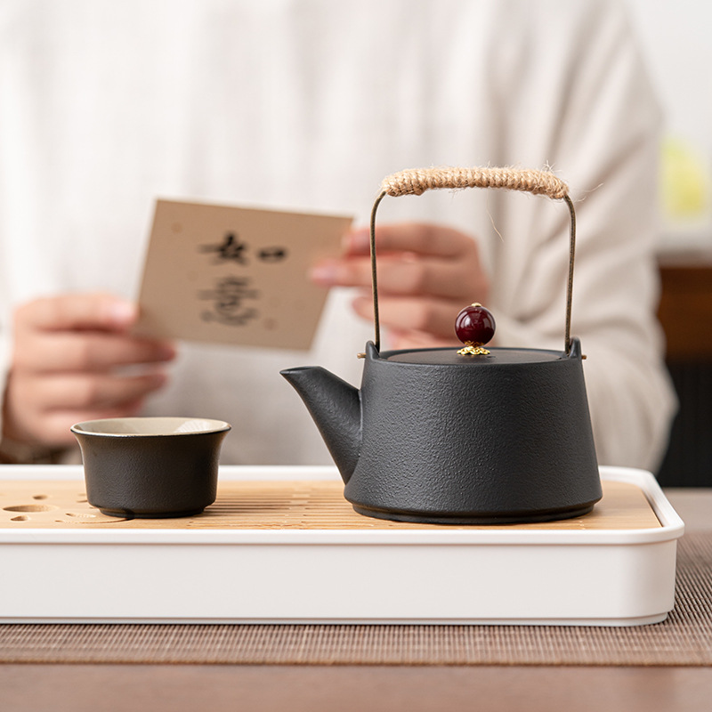 Bộ trà Kung Fu du lịch Nhật Bản bộ nhỏ ấm pha trà cao cấp gia dụng cốc trà gốm sứ khay trà ngoài trời túi xách tay