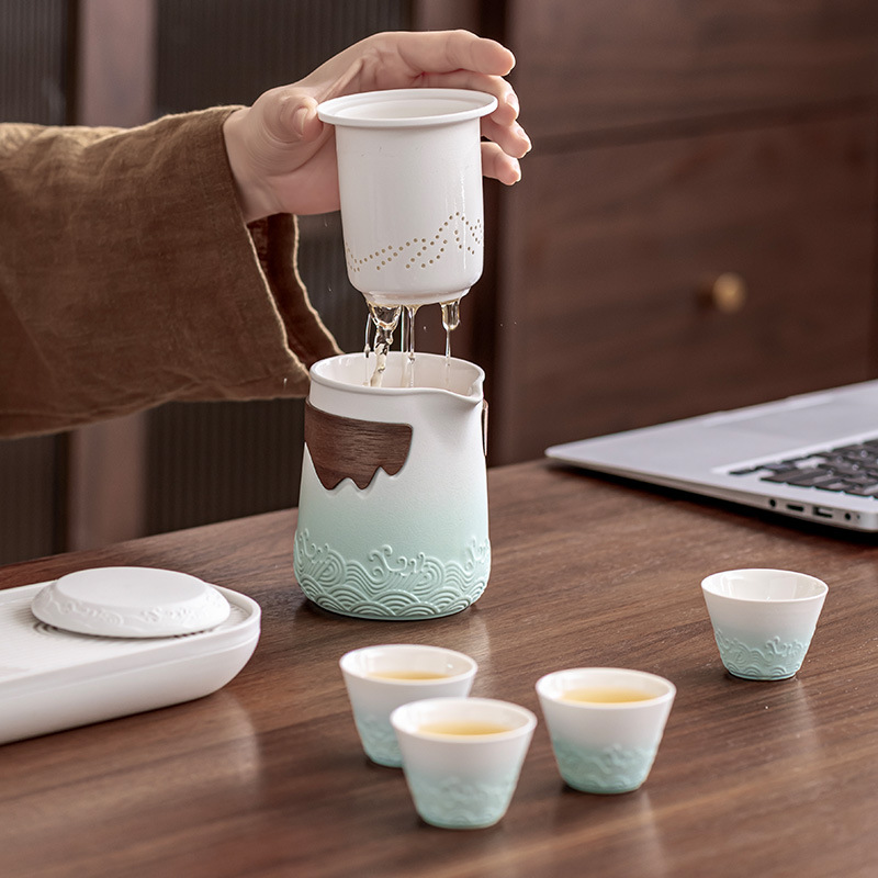 Bộ trà du lịch kiểu Nhật Bộ trà Kung Fu một ấm bốn cốc cốc khách nhanh ngoài trời cao cấp hiện đại đơn giản xách tay