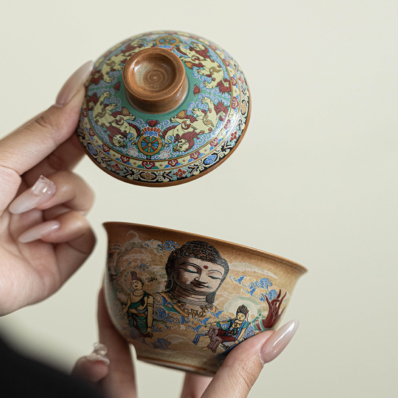 Bộ trà du lịch tượng Phật Đôn Hoàng một ấm bốn cốc du lịch ngoài trời di động Bộ trà Kung Fu gốm sứ gia dụng