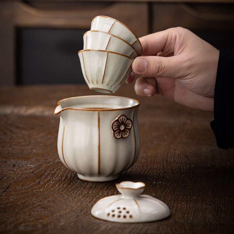 Bộ trà du lịch Daji Mi Huang Ru Kiln Bộ trà nhỏ cầm tay pha trà ngoài trời một ấm ba cốc nhanh Bộ trà Kung Fu