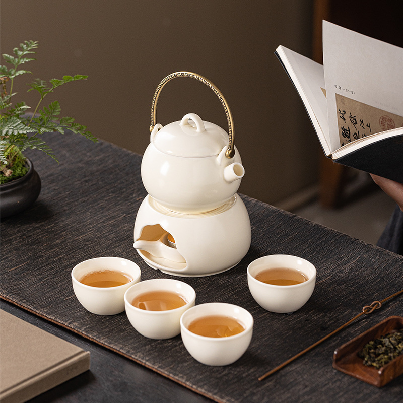 2024 kiểu mới gốm cầm xà ấm ấm ấm trà bếp pha trà xung quanh bếp nến đế ấm trà bộ trà hộp quà pha trà