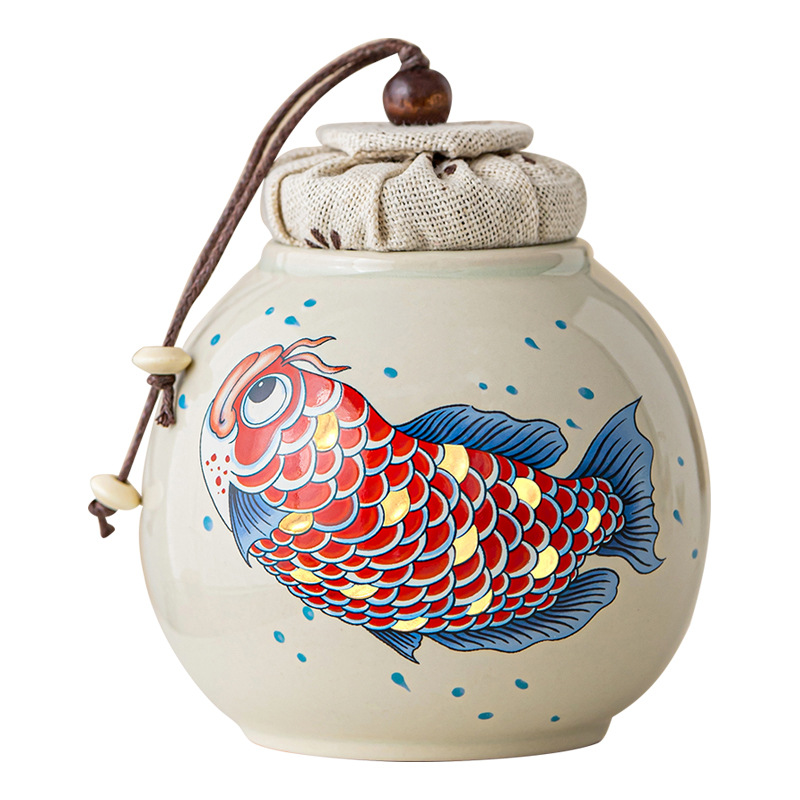 Thùng trà kho báu tròn màu xám thực vật Thùng trà nhỏ lưu trữ cao cấp Jinyu Mantang Thùng trà cầm tay Thùng kín Hộp trà Thùng trà