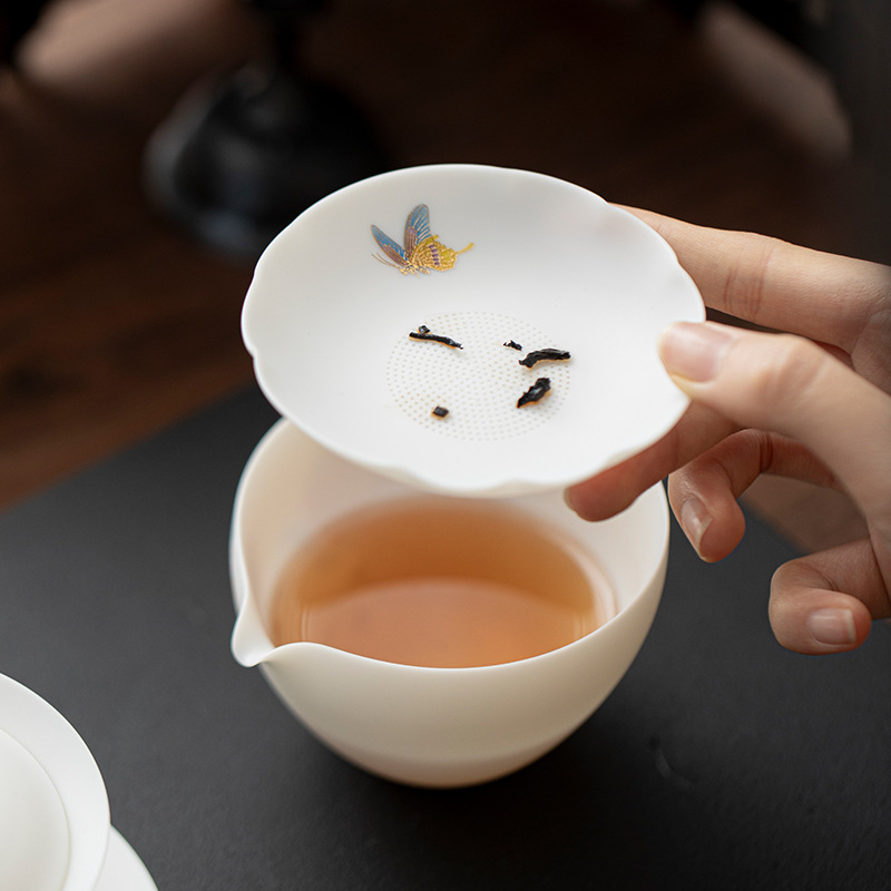 Ngọc sứ lọc trà gốm lọc trà chống lá kung fu bộ trà phụ kiện trà nghệ thuật lọc trà thảm bộ quà tặng