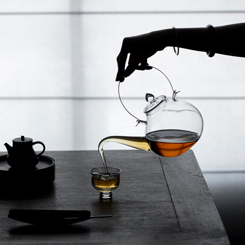 Ấm trà thủy tinh borosilicat cao cấp, ấm đun nước chịu nhiệt mới để đun trà, dùng được trên bếp điện gốm và bếp lửa.