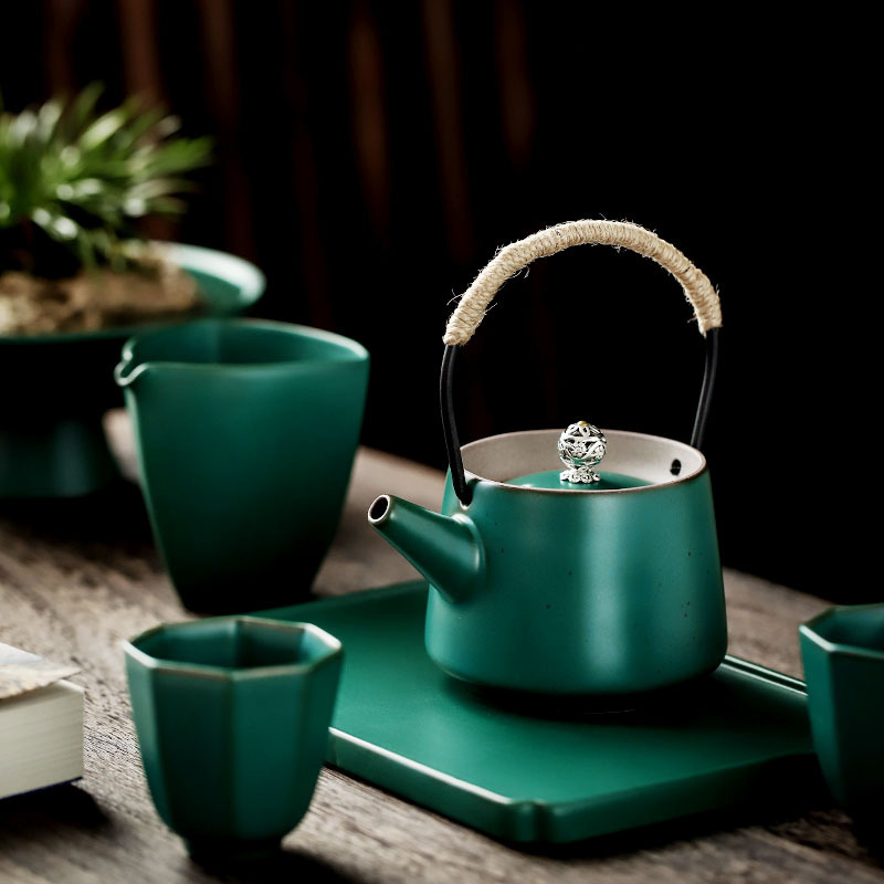 Bộ ấm trà du lịch cầm tay cổ điển kiểu Trung Quốc bộ ấm trà Kung Fu gốm sứ đơn giản bộ nhỏ bộ ấm trà bếp nến