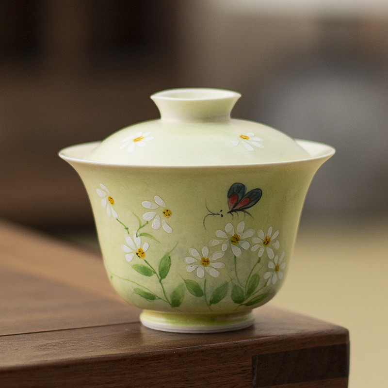Bộ ấm chén trà gốm sứ phong cách hiện đại đơn giản, kiểu dáng Ins, họa tiết hoa cúc vẽ tay dưới men, kiểu dáng chén phủ men.
