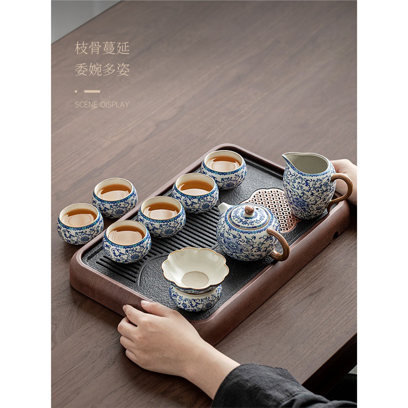 Bộ ấm trà gốm sứ trắng xanh bộ bàn trà nhỏ gia dụng chuyên dụng pha trà mẫu mới 2025 bộ cao cấp nhẹ nhàng