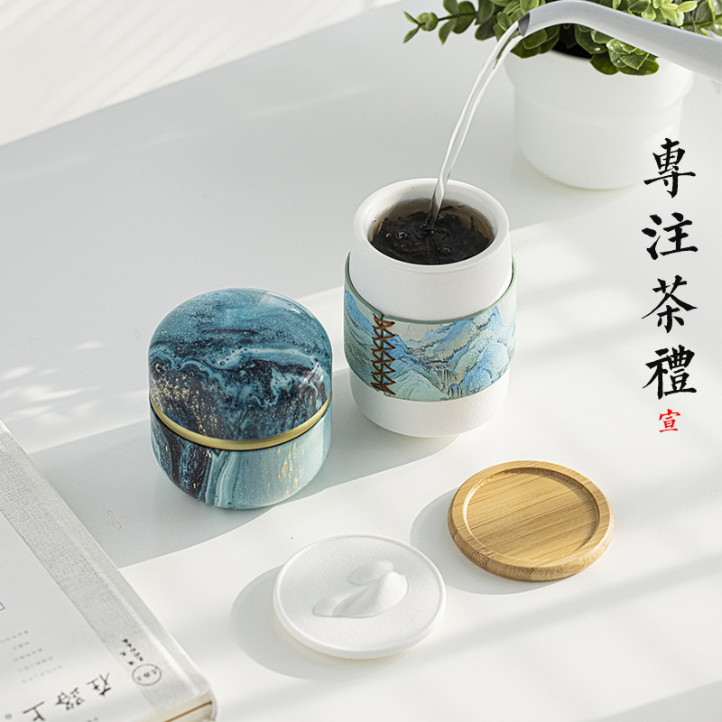 Qianli Jiangshan gốm sứ văn phòng gia dụng cốc nước hộp quà Quốc Triều tặng doanh nghiệp cốc trà Bộ trà du lịch